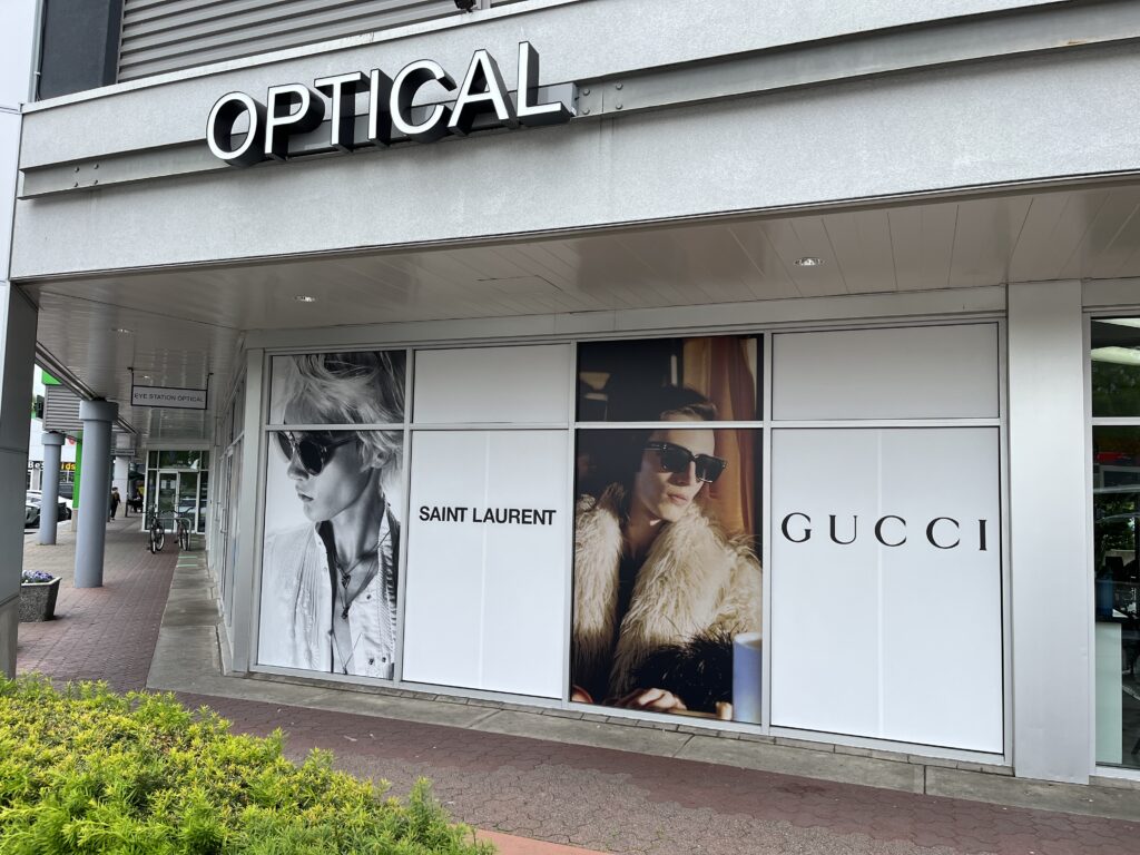 opaque vinyl windopw wrap on optical storefront