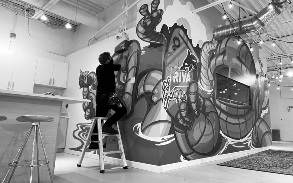 graphic installation of a vinyl wall mural, vancovuer bc