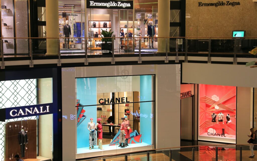 visual merchandising and interior window graphics for storefronts in a mall
