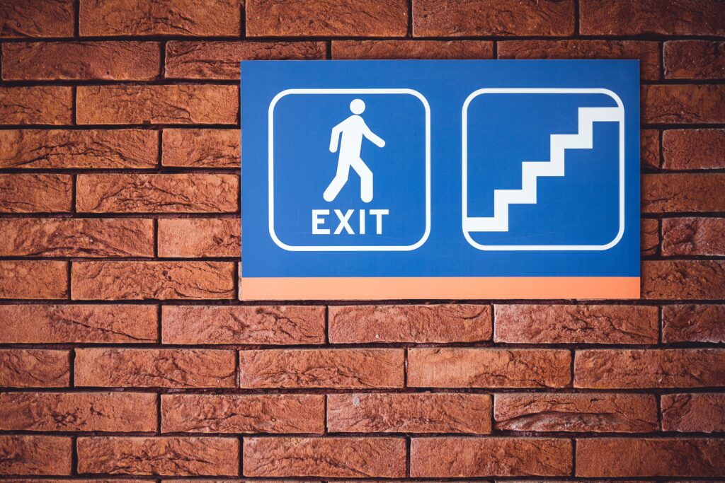wayfinding-sign-on-brick-wall